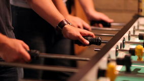 gripping the foosball rods