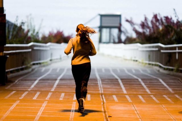 woman running on street