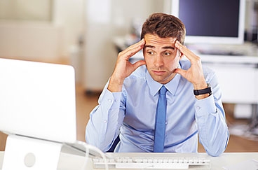 frustrated dude looking at computer