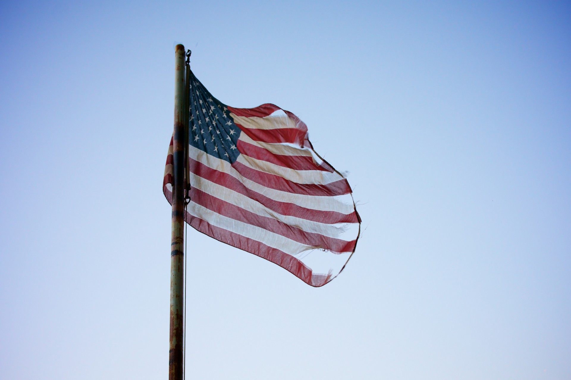 tattered american flag